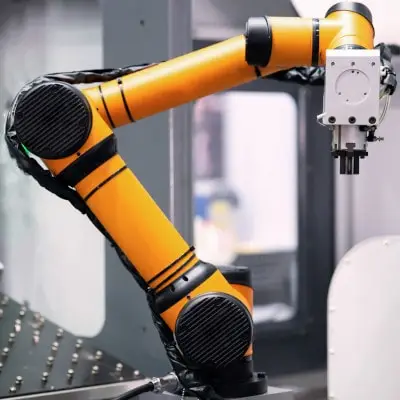 Industrial robot arm in a production cell
